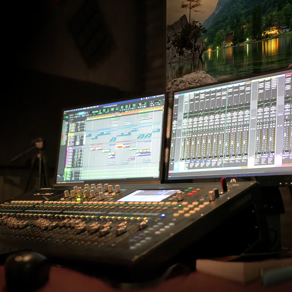ARM Cine Studio professional post-production workspace with editing consoles and sound mixing equipment