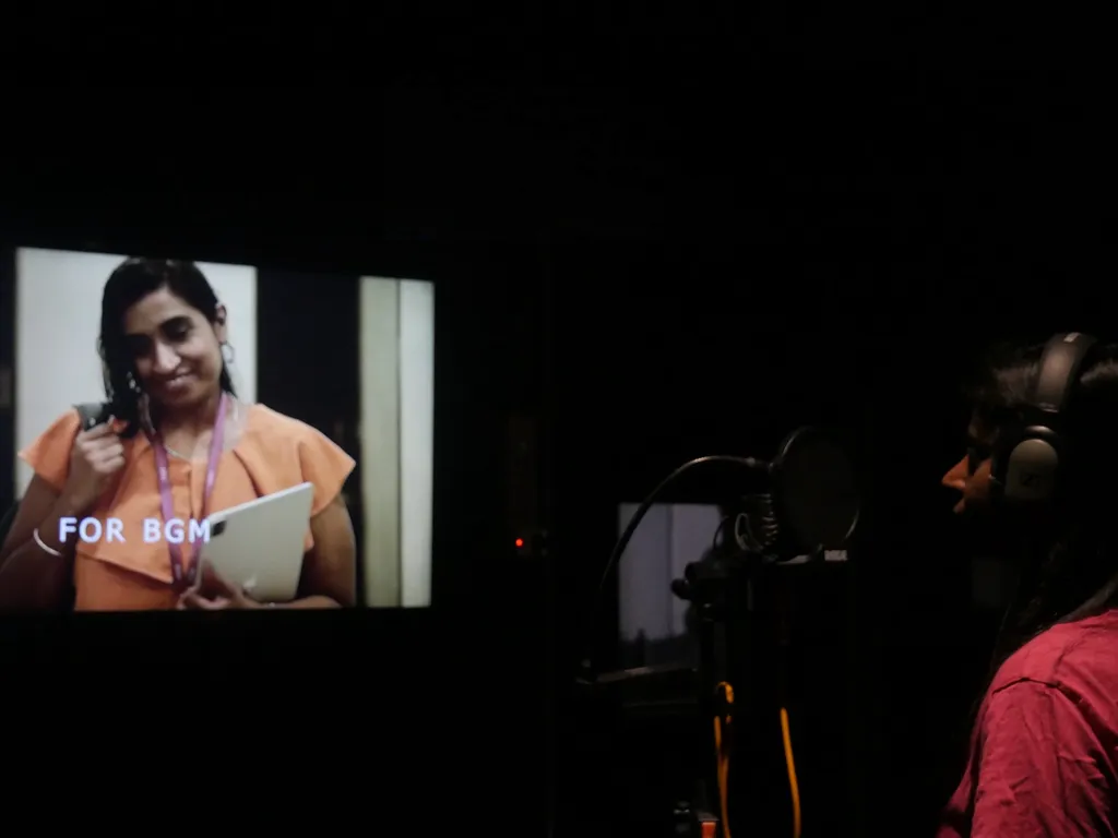 Color grading suite with calibrated monitor showing before and after images from DI process